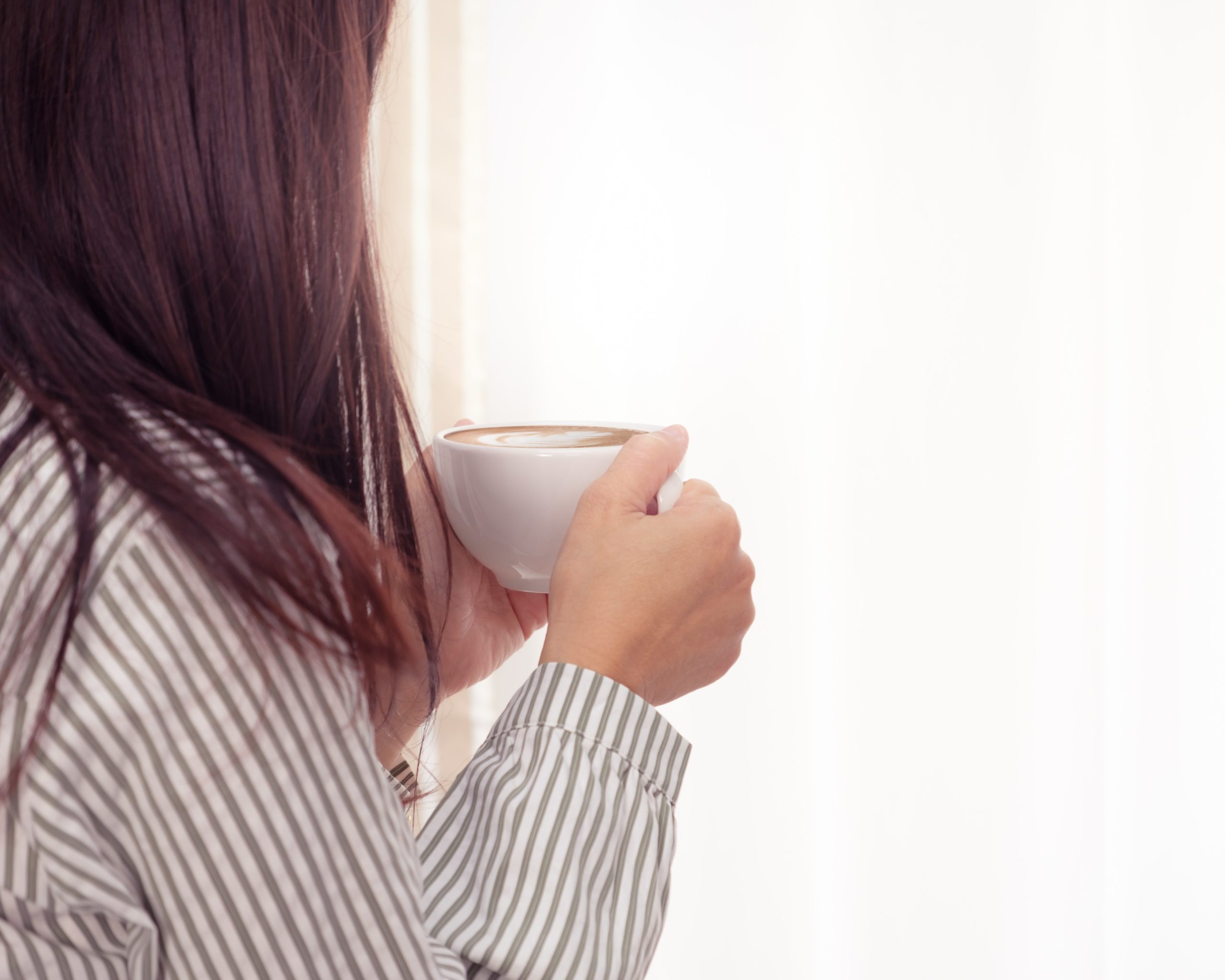 photo-of-woman-holding-cup-of-coffee-1028736 Miller Sports and Family Chiropractic